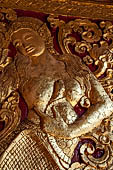 Wat Xieng Thong temple in Luang Prabang, Laos. the Ho Tai, the library. Detail of the console of the roof. 